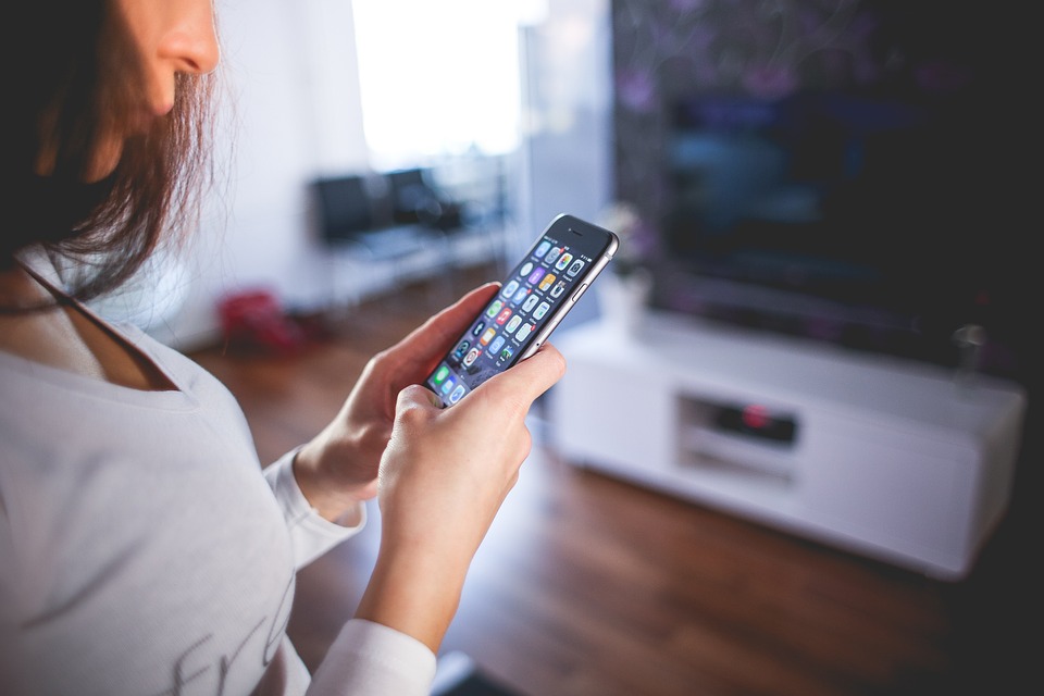 girl using an iPhone